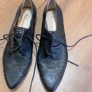 Stylish black cut out shoe